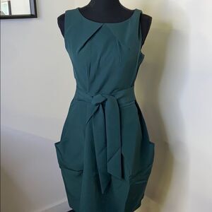 Apricot sleeveless green belted pocket Dress